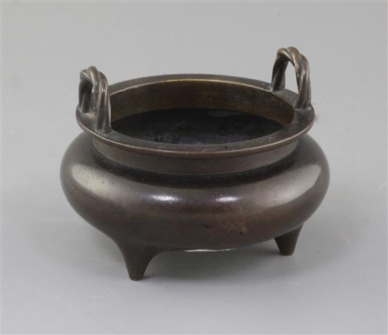 A Chinese bronze tripod censer, diameter 10cm